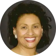 Professional smiling woman, TMJ & Sleep Therapy expert in North Texas.