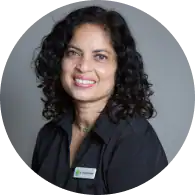 Friendly TMJ & sleep therapy expert smiling, professional portrait.